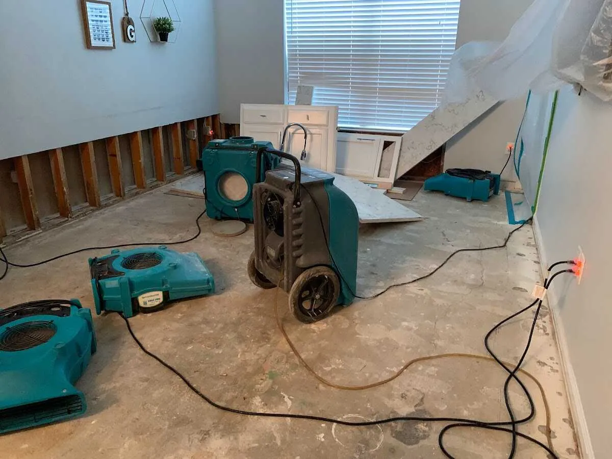 Dehumidifier in flood-cut room for Water Damage Restoration in Northglenn